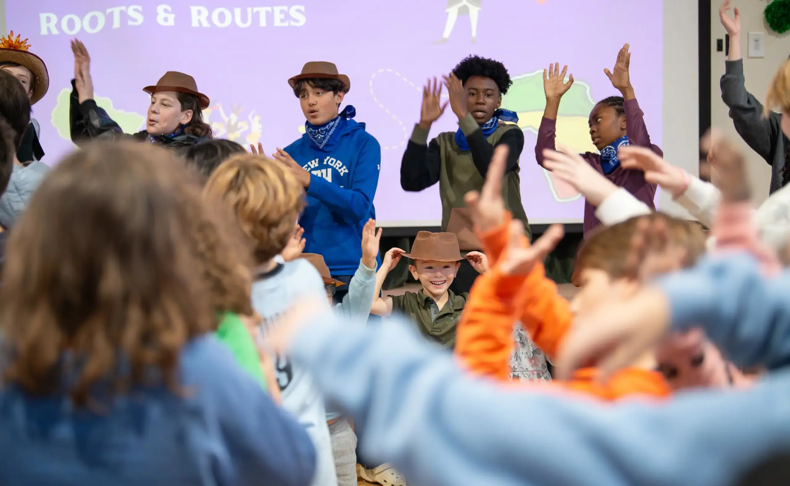 Students performing onstage