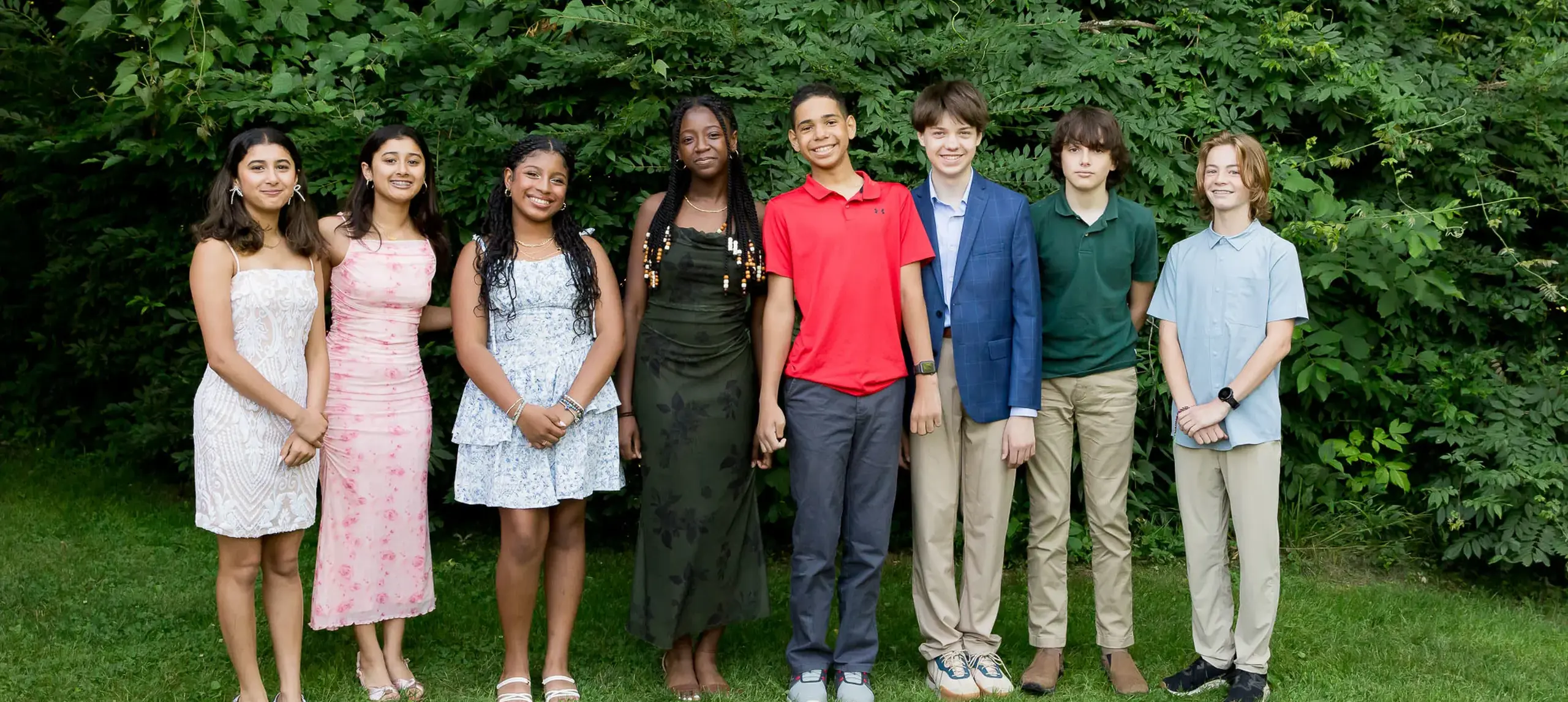 Students posing in group on field