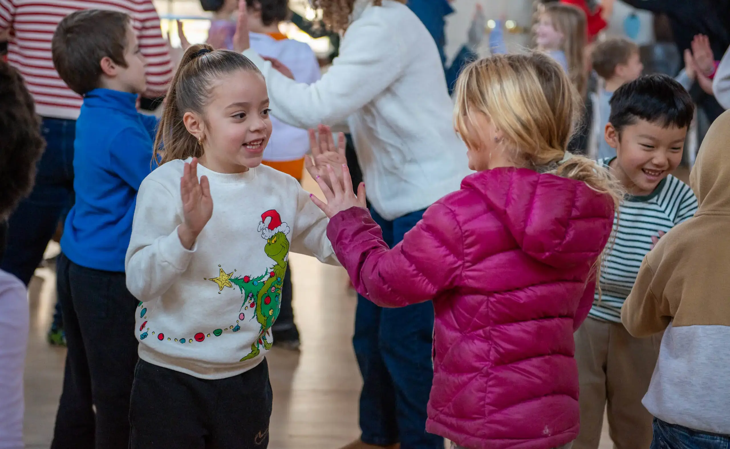 Students playing a clapping game