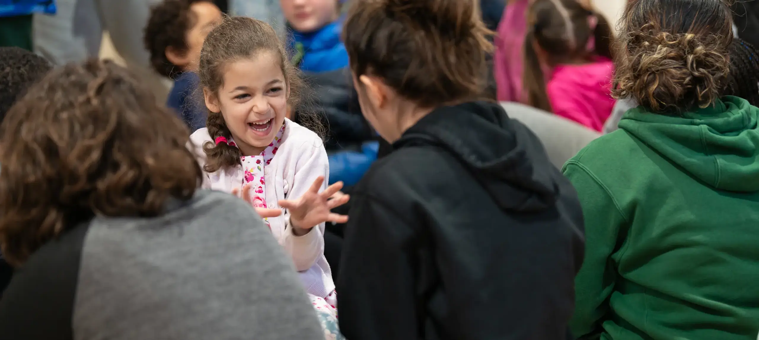 Student laughing in group