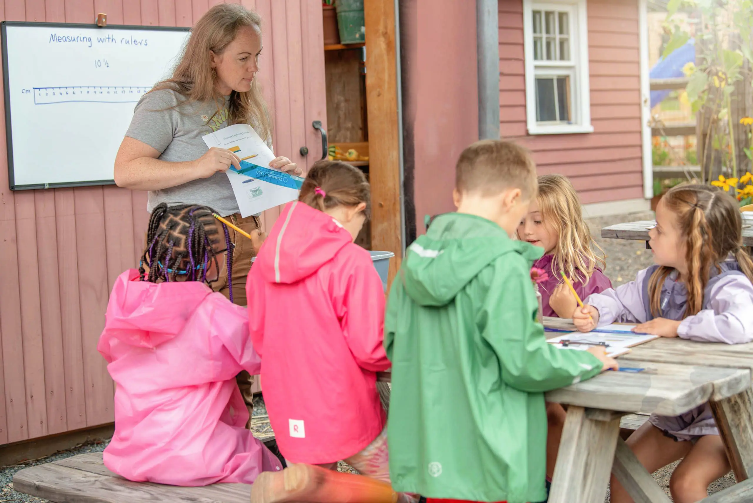 Teacher giving outdoor lesson