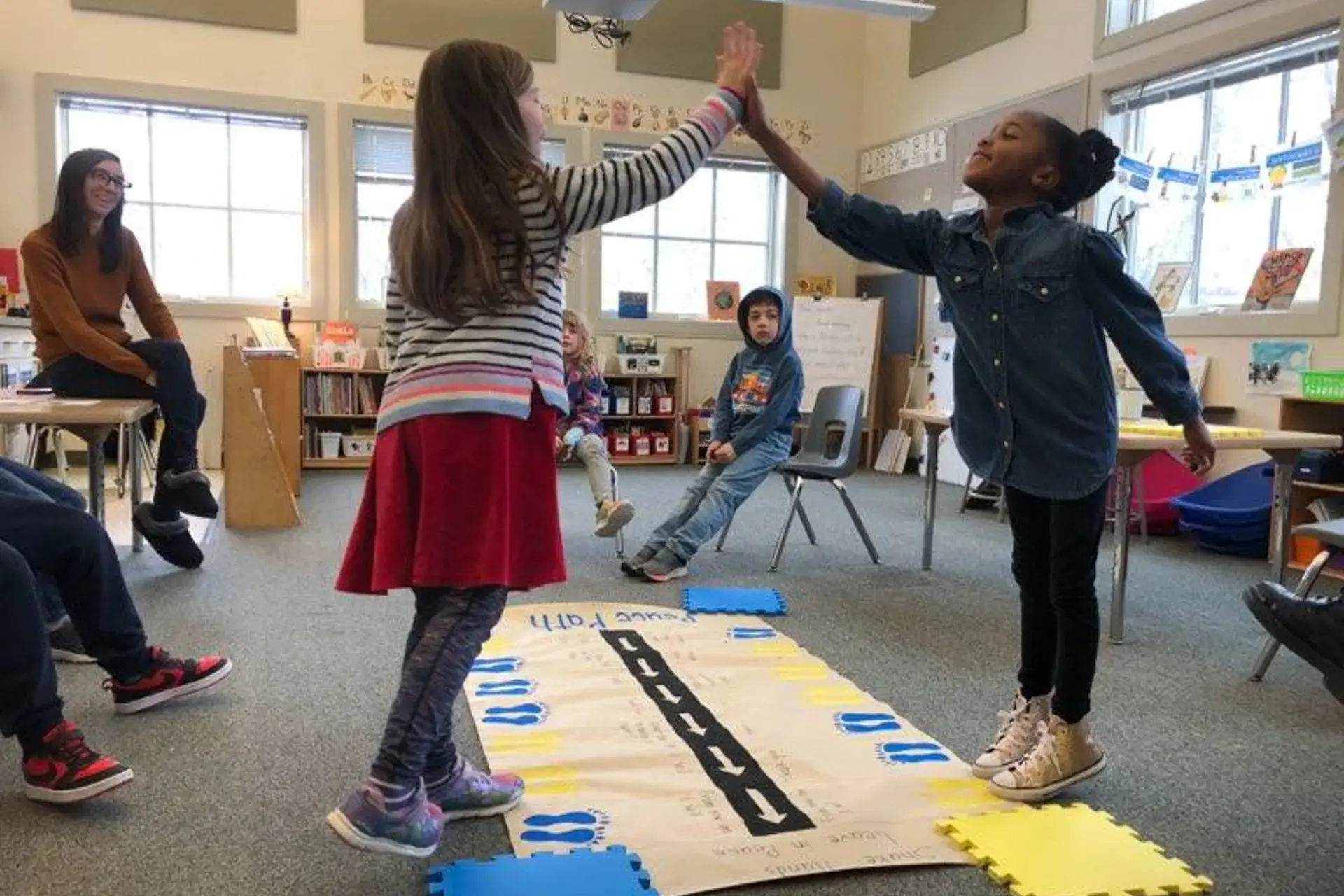 Students high-fiving