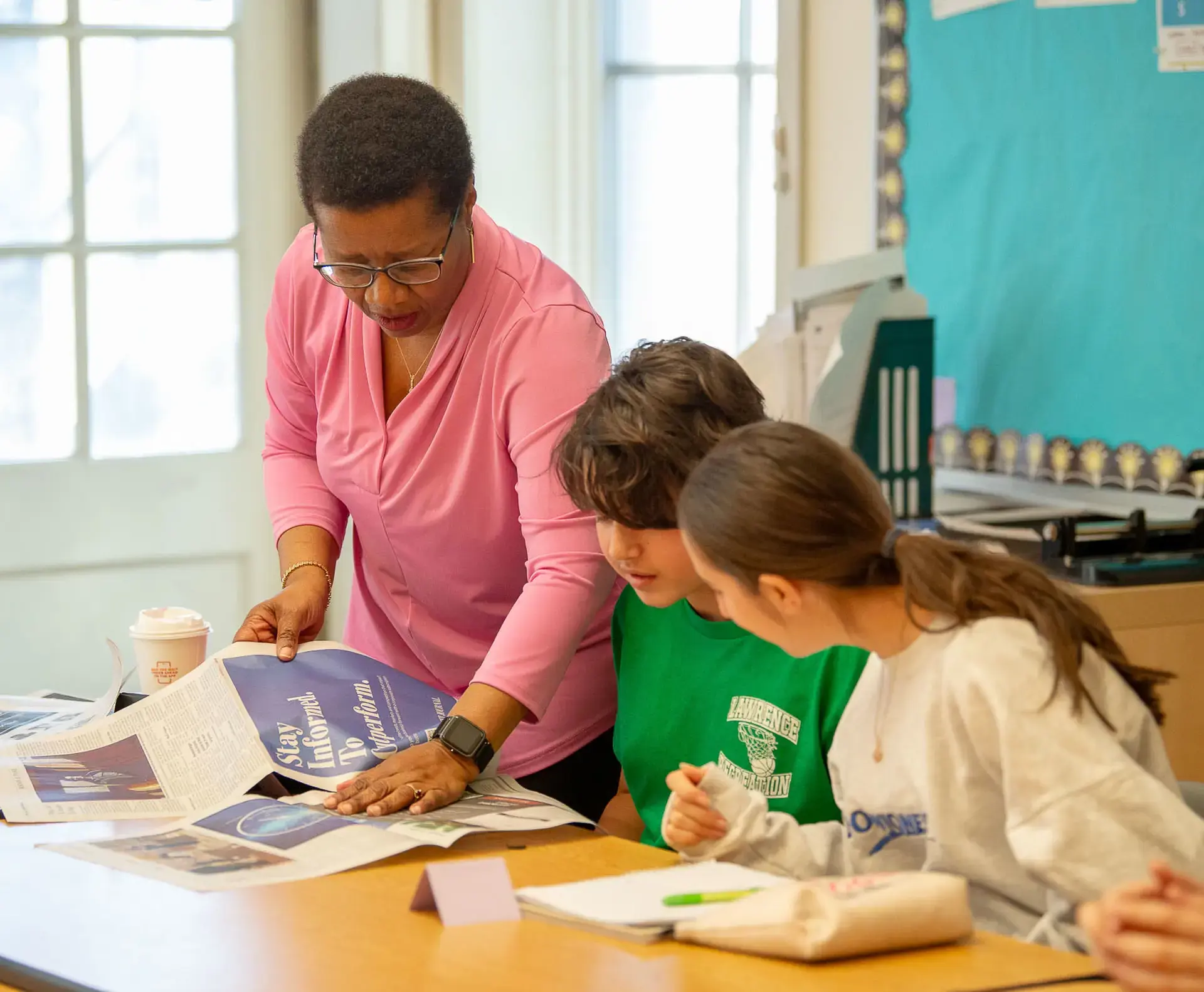 Students and teacher workshopping