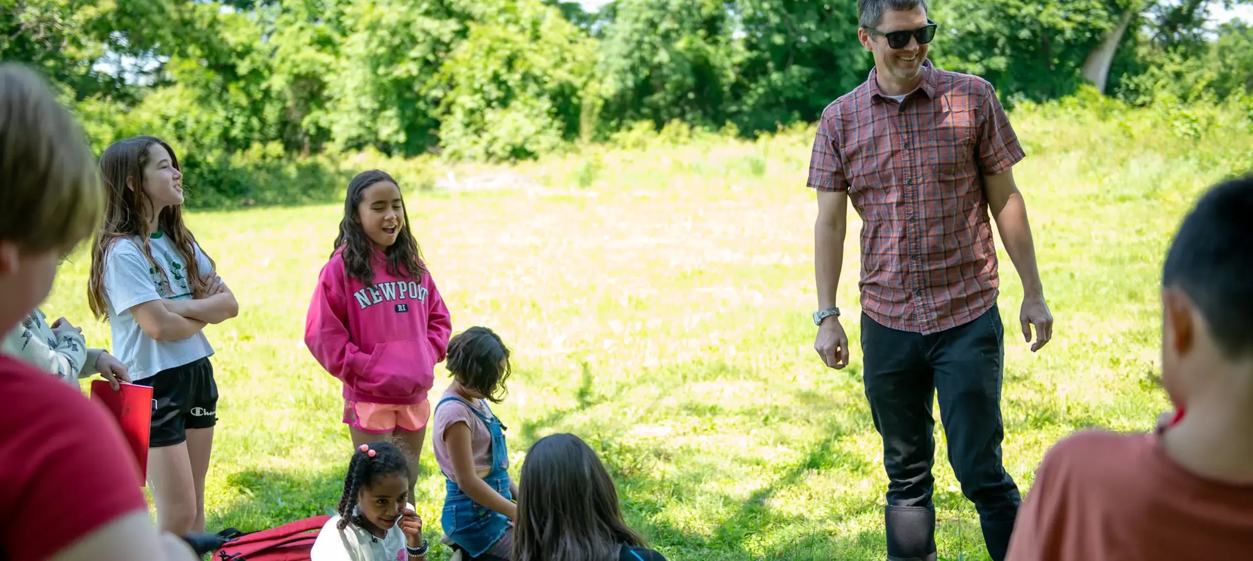 Students and teacher outside