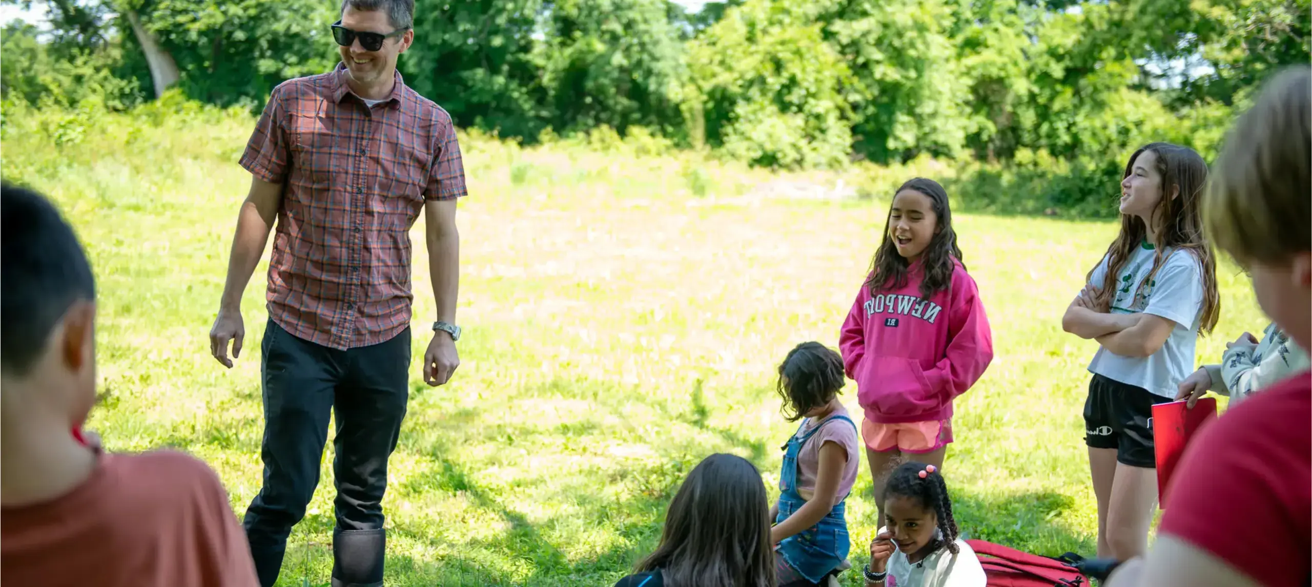 Students and teacher outside