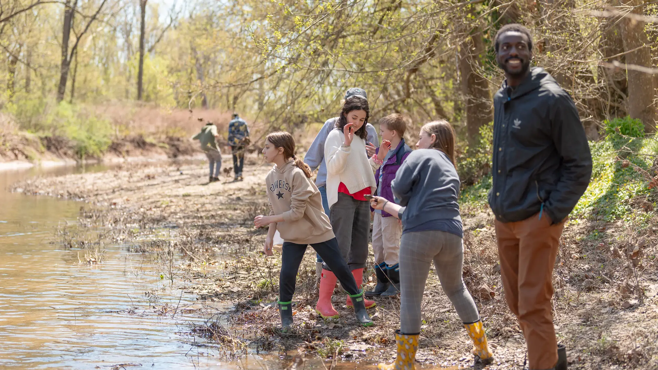 Students walking along river